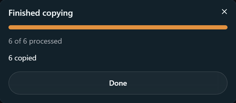 The finished dialog with a full progress bar, 6 of 6 processed, and 6 copied